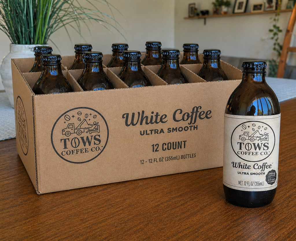 Tows White Coffee Cold Brew 12 Pack on a mahogany table
